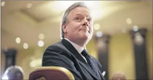  ?? CP PHOTO ?? Bank of Canada Governor Stephen Poloz listens to remarks after addressing the Canadian Club of Toronto, on Thursday December 14, 2017.