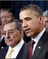  ?? AP/HARAZ N. GHANBARI ?? President Barack Obama, with Defense Secretary Leon Panetta (left), said Thursday that the U.S. is “turning the page on a decade of war.”