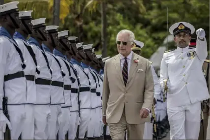  ?? Luis Tato/Associated Press ?? Britain’s King Charles III inspects the guard of honor on a visit to meet Royal Marines and Kenyan Marines at Mtongwe Naval Base, in Mombasa, Kenya in November.