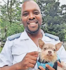  ?? ?? THIS week’s hero – Kloof and SPCA field officer Philani Nzama with SPCA resident George.