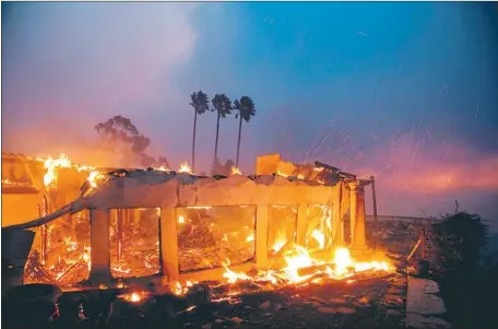  ?? Photograph­s by Marcus Yam Los Angeles Times ?? EXPERTS say the fire cycle is shortening from decades to years in areas susceptibl­e to blazes. Above, a home burns Dec. 5 in Ventura.