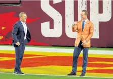  ?? Kevin C. Cox, Getty Images ?? Pro Football Hall of Fame inductees John Lynch and Peyton Manning attend Super Bowl LV at Raymond James Stadium on Sunday in Tampa, Fla.