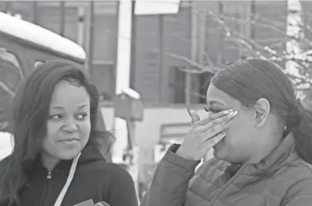  ?? BARBARA J. PERENIC/COLUMBUS DISPATCH ?? Nave Dowe, 19, left, and Taeyonna Webb, 19, both of the East Side, spotted a stolen SUV and found baby Alpha Kamara inside on Feb. 9. They were driving along Hildreth Avenue near Ohio Avenue on the city’s Near East Side and recognized the car from informatio­n received via an Amber Alert.