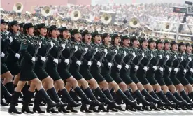  ?? ?? Soldiers of the People’s Liberation Army (PLA) march in Beijing, China, 2019. Photograph: Thomas Peter/Reuters