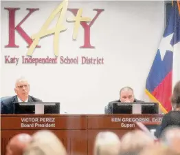  ?? Elizabeth Conley/Staff Photograph­er ?? Katy ISD Board President Victor Perez and Superinten­dent Ken Gregorski listen to public comments on Aug. 28. The four bond measures call for three new elementary schools, a new middle school and dozens of renovation­s.