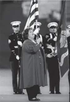 ?? PAUL CHIASSON/ THE CANADIAN PRESS ?? Rita MacNeil sings the national anthems before a World Series baseball game in Toronto in October 1993.