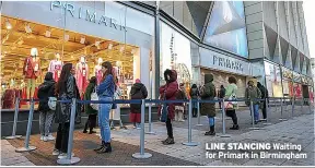  ?? ?? LINE STANCING Waiting for Primark in Birmingham