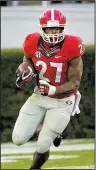  ?? AP/ JOHN BAZEMORE ?? Georgia running back Nick Chubb underwent reconstruc­tive knee surgery in 2015 but returned last season to rush for 1,130 yards and eight touchdowns.