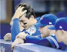  ?? VAUGHN RIDLEY/GETTY IMAGES ?? Darwin Barney and the rest of the Toronto Blue Jays hitters were thrown for a loop by the Cleveland Indians’ pitchers in the ALCS. There will be no victory parade this year.