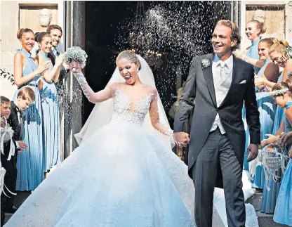  ??  ?? Say ‘yes’ to those dresses: Victoria Swarovski, left and above, Alex Edwards, below left, and Hannah Bronfman, below right, all had multiple dresses to suit the various events of their big day