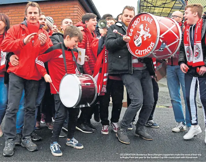  ??  ?? CELEBRATIO­N: Boisterous Brora Rangers supporters make the most of their trip to Rugby Park last year for the Scottish Cup fifth round clash with Kilmarnock