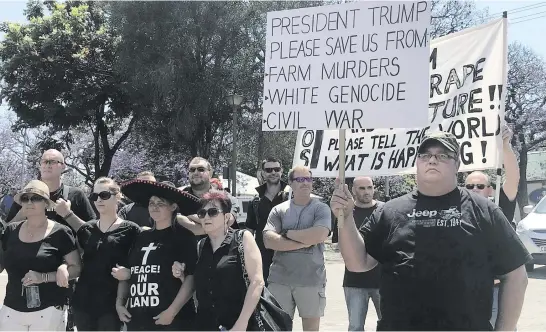  ?? Pictures: Reuters ?? PLEA. Protesters calling for the end of farm murders march to the US and Australian embassies in Pretoria earlier this year.
