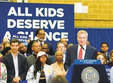  ?? TODD MAISEL/NEW YORK DAILY NEWS PHOTOS ?? Mayor de Blasio speaks about ending the HSAT test during a June 3 gathering with officials, elected leaders and the schools chancellor at J.H.S. 292 in East New York, Brooklyn.