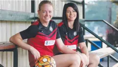  ?? Picture: STEWART McLEAN ?? TEAM SPIRIT: Maddy Cater and Helen Cross are ready to play Innisfail in the grand final today.