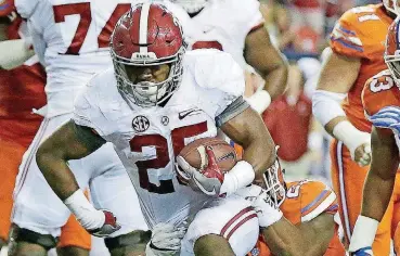  ?? [AP PHOTO] ?? True freshman Josh Jacobs is one of the running backs powering Alabama’s potent run game heading into Monday’s national championsh­ip contest vs. Clemson. A year ago, the Oklahoma native didn’t have a scholarshi­p offer from any Power 5 school, much less...