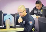  ?? MARLA BROSE/JOURNAL ?? Albuquerqu­e police officer Eric Jojola navigates CYFD’s new Law Enforcemen­t Portal during a training session Tuesday at CYFD’s offices on San Mateo NE.