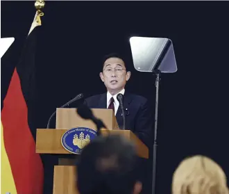  ?? The Yomiuri Shimbun ?? At a press conference following the closing of the 2022 G7 summit in Germany, Prime Minister Fumio Kishida announces that Japan will host the next G7 summit in Hiroshima on May 19-21, 2023.