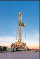  ?? [PHOTO PROVIDED BY NEWFIELD EXPLORATIO­N CO.] ?? A rig drills a well for Newfield Exploratio­n in Oklahoma's Anadarko Basin. The company will become part of Encana Corp. in a deal that closes today.