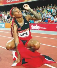  ?? Reuters ?? Michelle-Lee Ahye of Trinidad and Tobago celebrates after winning a gold in the women’s 100-metre final.