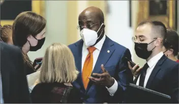  ?? ANDREW HARNIK/AP ?? SEN. RAPHAEL WARNOCK, D-GA., SPEAKS Capitol in Washington, Oct. 5. to reporters after a Democratic policy meeting at the