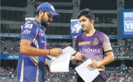 ?? BCCI ?? Mumbai Indians captain Rohit Sharma (left) knows their excellent record won’t matter if he can't lead his team to victory against a tough Kolkata Knight Riders.