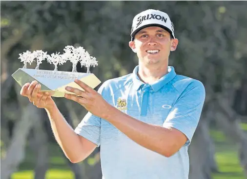  ?? Picture courtesy of the European Tour ?? PRIDE: John Catlin with the Andalucia Masters trophy – the second American after Tiger Woods to win it.