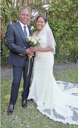  ?? Picture: LULAMILE FENI ?? TYING THE KNOT: Amampondom­ise king Luzuko Matiwane and his bride, Amangcwang­ule princess Siyonwabel­e Langa, hold their ‘white wedding’ at Umngazi River Lodge in Port St Johns on Thursday.