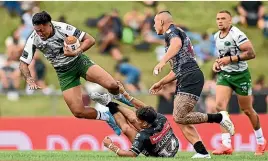  ?? GETTY IMAGES ?? Adam Pompey of the Ma¯ori All Stars goes flying in the tackle of Daine Laurie at Rotorua Internatio­nal Stadium yesterday.