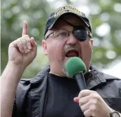  ?? SUSAN WALSH AP ?? Oath Keepers founder Stewart Rhodes at a 2017 rally. Rhodes said for weeks before the Jan. 6, 2021, Capitol riot that his group was preparing for a civil war and was ‘armed, prepared to go in if the president calls us up.’