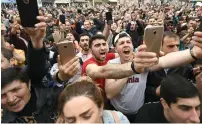  ?? AFP ?? Supporters of Armenian opposition leader Nikol Pashinyan attend a rally in the small town of Dilijan on Saturday. —