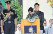  ?? NITIN KANOTRA/HT ?? Former Jammu and Kashmir CM Mehbooba Mufti takes oath during her swearingin ceremony.