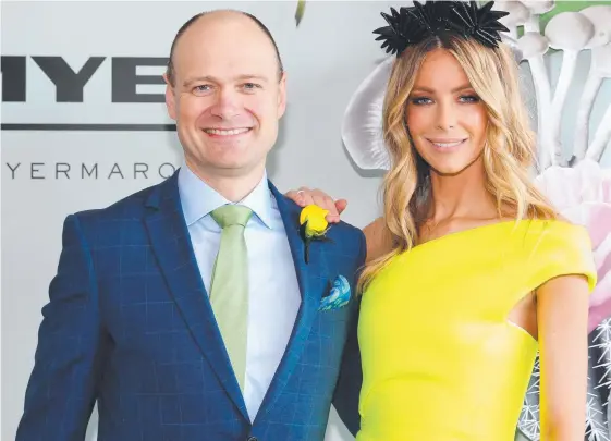  ?? Picture: AARON FRANCIS ?? Myer Chief Executive Richard Umbers with the chain’s fashion ambassador Jennifer Hawkins.