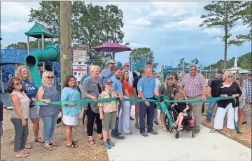  ?? Catoosa County Chamber of Commerce ?? The ribbon-cutting for the new playground in Fort Oglethorpe was conducted by the Catoosa County Chamber of Commerce and attended by officials and employees of Fort Oglethorpe and Catoosa County.