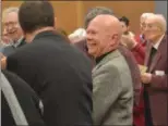  ?? KEITH REYNOLDS — THE MORNING JOURNAL ?? Rev. Jimmy W. Madsen smiles as congregati­on members applaud his service Dec. 10 at First Lutheran Church, 1019 West 5th St. in Lorain, during his retirement celebratio­n.