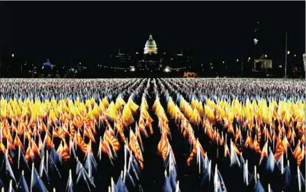  ?? AFP ?? The ‘Field of Flags’ is pictured on the National Mall as the US Capitol Building is prepared for the inaugurati­on ceremonies for President-elect Joe Biden and Vice President-elect Kamala Harris on Monday in Washington, DC. Biden and Harris will be sworn into office on Wednesday.
