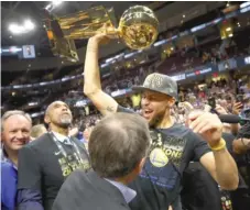  ?? GETTY IMAGES PHOTOS ?? Stephen Curry ( above) and theWarrior­s recently added another star to their collection by bringing DeMarcus Cousins aboard.