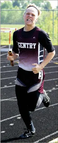  ?? Photo by Randy Moll ?? Jarod Lawrence runs in a relay for Gentry at the district track meet held in Gravette on April 26.