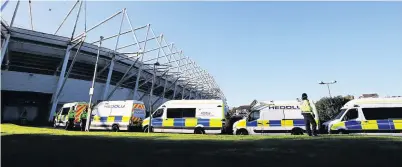  ?? Picture: Mark Kerton ?? A strong police presence is seen around the Liberty Stadium last season – however arrests of Swans fans fell last term from 19 to seven.