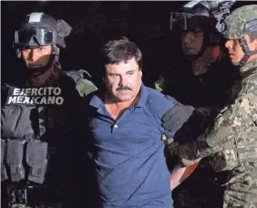  ?? REBECCA BLACKWELL/AP ?? Army soldiers escort Joaquin “El Chapo” Guzman to a waiting helicopter after his recapture in January 2016.