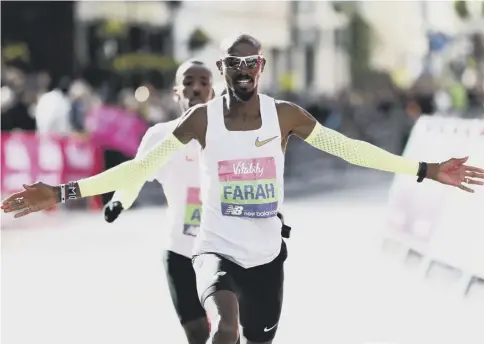  ?? PICTURE: BRYN LENNON/GETTY ?? 0 Sir Mo Farah celebrates winning the men’s Vitality Big Half in London for the second year in a row.