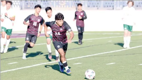  ?? Mark Ross/Special to the Herald-Leader ?? Siloam Springs senior Ronald Mancia chases after a loose ball against Alma on March 14 at Panther Stadium. The Panthers defeated the Airedales 1-0.