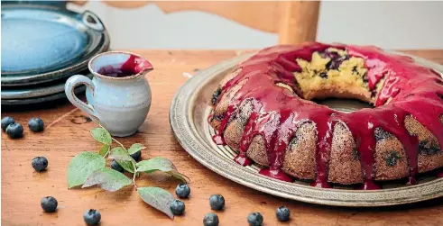  ?? NICOLA GALLOWAY ?? Fresh blueberrie­s have an amazing ability to set like jelly when blended and cooled, which is perfect for this blueberry, lemon and coconut cake with blueberry glaze.