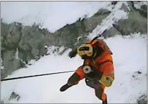  ?? U.S. COAST GUARD VIA AP ?? In this image taken from video provided by the U.S. Coast Guard, U.S. Coast Guard Air Station Detroit and Station Marblehead respond to a report of ice fishermen stranded on an ice floe near Catawba Island on Lake Erie Jan. 22. Twenty people were rescued from an ice floe in Lake Erie, the Coast Guard said Monday.