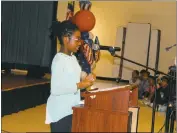  ??  ?? Eva Turner Elementary School student Jayla Kelley reads the poem, “The Best on Earth.”