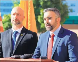  ?? SUSAN MONTOYA BRYAN/ASSOCIATED PRESS ?? State Workforce Solutions Secretary Bill McCamley, left, and 2nd Judicial District Attorney Raúl Torrez announce a wage lawsuit against Hacienda del Rio at a news conference Thursday in Albuquerqu­e.