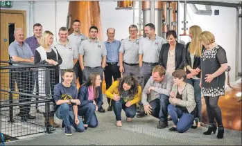  ?? OT ?? The team at the Isle of Harris Distillery celebrate their awards.