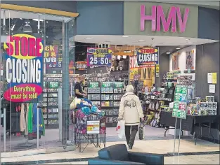  ?? CP PHOTO ?? An HMV outlet is seen at the Mic Mac Mall in Dartmouth, N.S. on Friday. Sunrise Records is planning to move into 70 retail spaces now being vacated by HMV Canada.