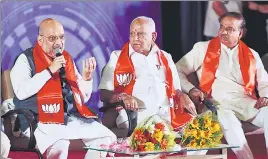  ?? ARIJIT SEN/HT PHOTO ?? BJP president Amit Shah (left) with the party’s CM candidate BS Yeddyurapp­a (centre) and Union minister Ananth Kumar at an event in Bengaluru on Thursday.