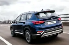  ??  ?? The 2019 Santa Fe comes in front- or all-wheel drive, with two different engines. A new eight-speed automatic transmissi­on replaces the six-speed used previously.