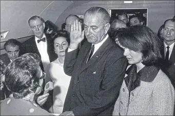  ??  ?? Lyndon B Johnson, alongside Jackie Kennedy, is sworn in as US President in 1963